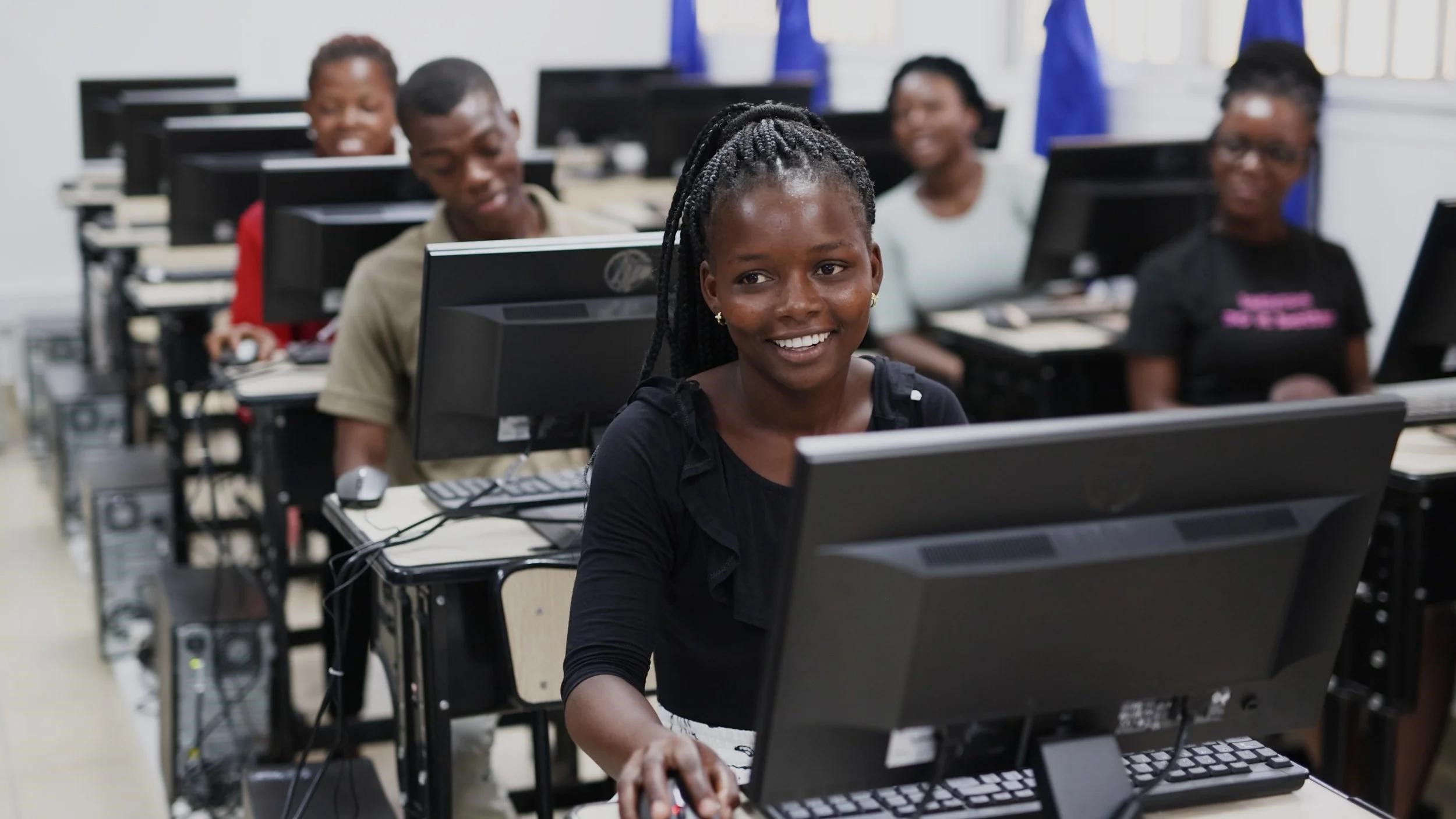 Students learning with computers