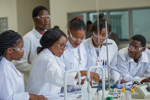 Students participating in science laboratory learning